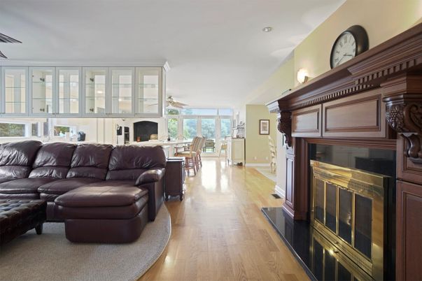 Dining room, Fireplace, Interior, Living room, Recessed Lighting, Wood Texture Flooring