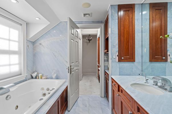 Bathroom, Chandelier, Dual Sink Vanities, Interior, Marble, Marble Walls, Recessed Lighting