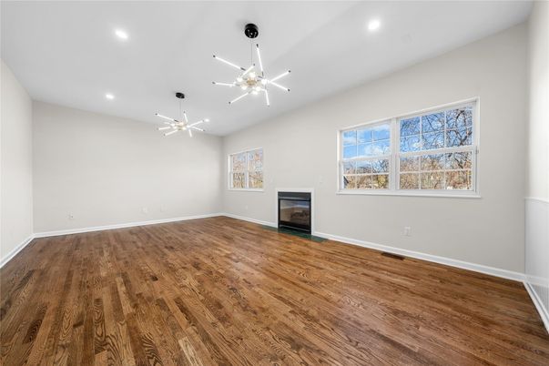 Empty room, Fireplace, Interior, Recessed Lighting, Wood Texture Flooring