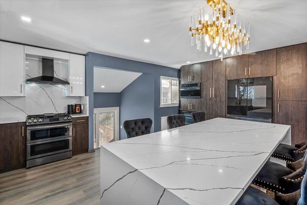 Dining room, Interior, Kitchen, Recessed Lighting, Stainless Steel Appliances, Wood Texture Flooring