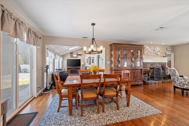 Chandelier, Dining room, Fireplace, Interior, Recessed Lighting, Wood Texture Flooring