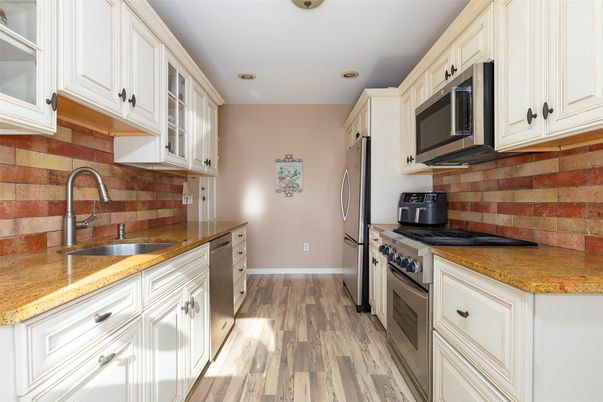 Interior, Kitchen, Recessed Lighting, Stainless Steel Appliances, Wood Texture Flooring