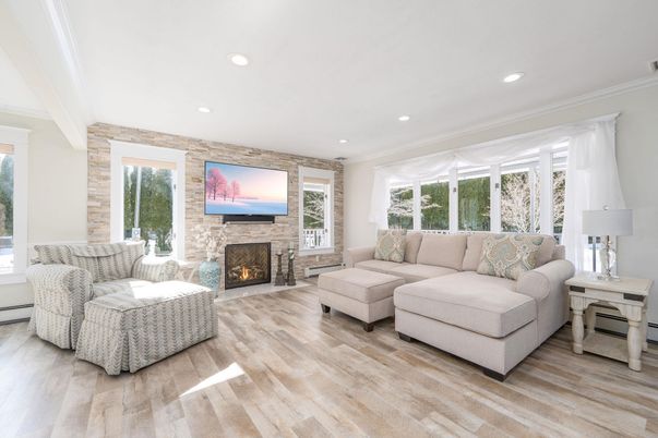 Fireplace, Interior, Living room, Recessed Lighting, Stone Walls, Wood Texture Flooring