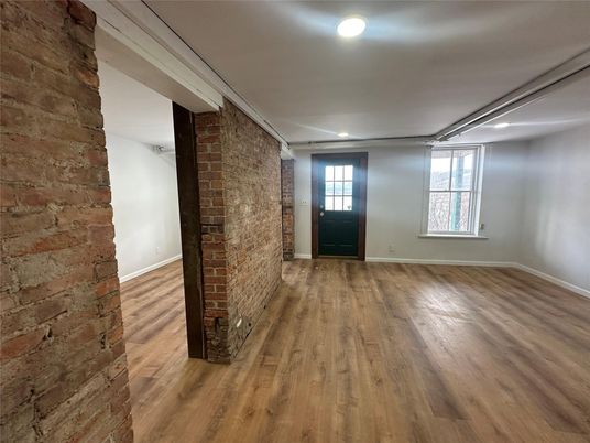 Empty room, Interior, Recessed Lighting, Stone Walls, Wood Texture Flooring