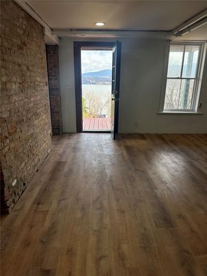 Empty room, Interior, Recessed Lighting, Stone Walls, Wood Texture Flooring