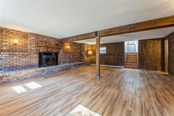 Empty room, Fireplace, Interior, Stone Walls, Wooden Beams, Wood Texture Flooring