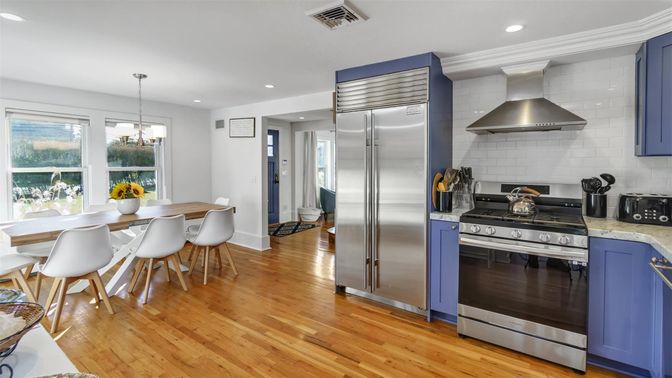 Chandelier, Dining room, Interior, Kitchen, Recessed Lighting, Stainless Steel Appliances, Wood Texture Flooring