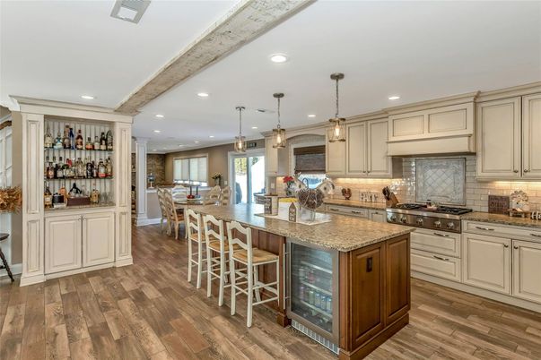 Dining room, Interior, Kitchen, Pendant Lights, Recessed Lighting, Stainless Steel Appliances, Wooden Beams, Wood Texture Flooring