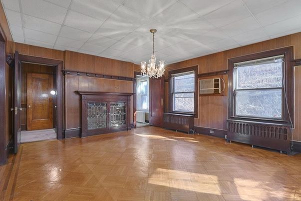 Chandelier, Empty room, Fireplace, Interior, Wood Texture Flooring, Wooden Walls