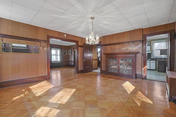 Chandelier, Empty room, Fireplace, Interior, Wood Texture Flooring, Wooden Walls