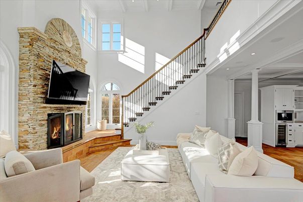Fireplace, Interior, Living room, Recessed Lighting, Stone Walls, Wood Texture Flooring