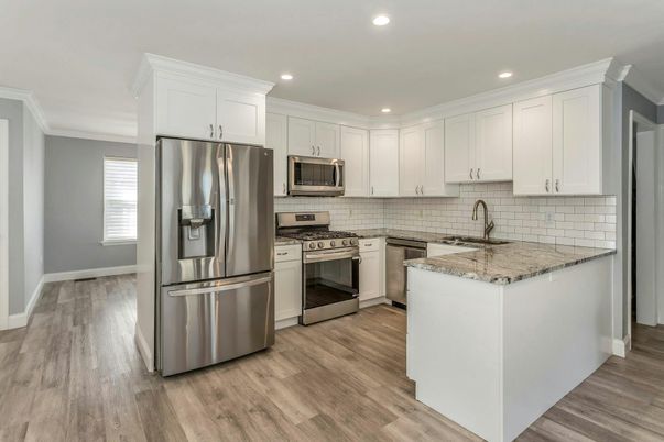 Interior, Kitchen, Recessed Lighting, Stainless Steel Appliances, Wood Texture Flooring