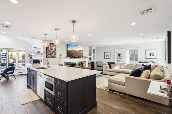 Fireplace, Interior, Kitchen, Living room, Pendant Lights, Recessed Lighting, Stainless Steel Appliances, Wood Texture Flooring