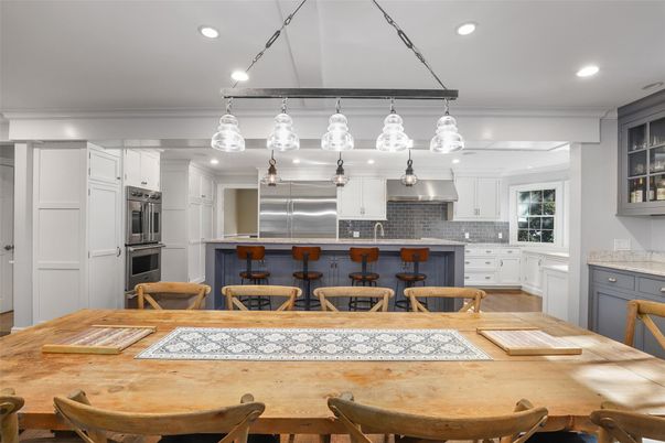 Dining room, Interior, Kitchen, Pendant Lights, Recessed Lighting, Stainless Steel Appliances, Wood Texture Flooring