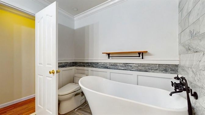 Bathroom, Free Standing Baths, Interior, Marble Walls, Wood Texture Flooring
