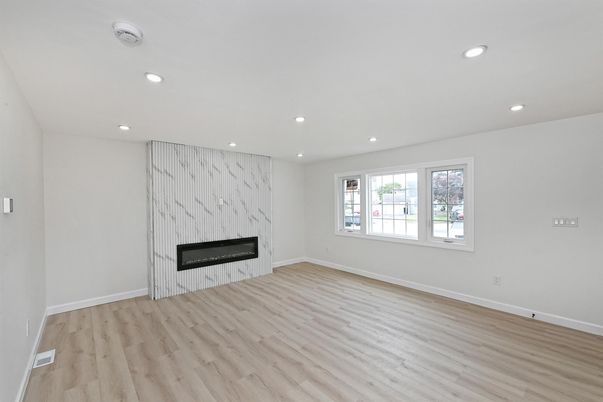 Empty room, Fireplace, Interior, Recessed Lighting, Wood Texture Flooring