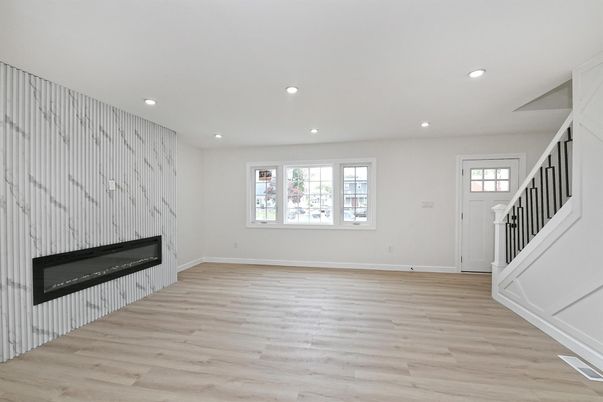 Empty room, Fireplace, Interior, Recessed Lighting, Wood Texture Flooring