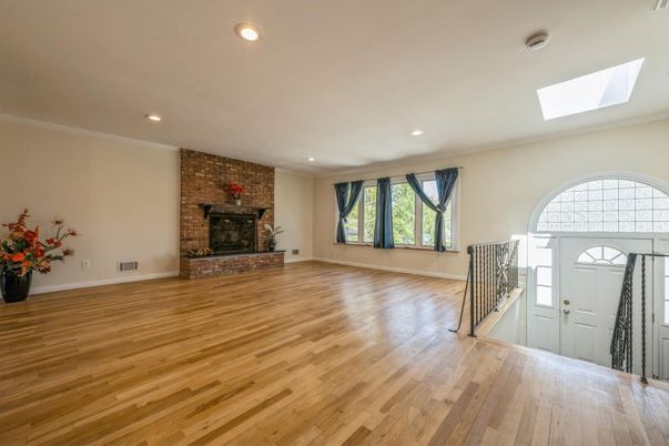 Empty room, Fireplace, Interior, Recessed Lighting, Stone Walls, Wood Texture Flooring