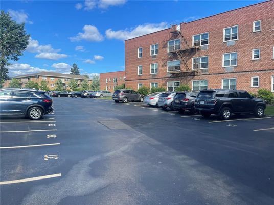 Exterior, Facade, Brick Facade, Condo Building