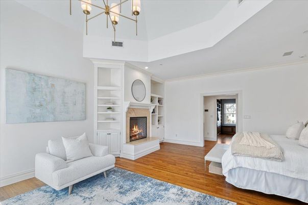 Bedroom, Fireplace, Interior, Pendant Lights, Recessed Lighting, Wood Texture Flooring