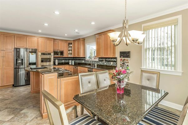 Chandelier, Dining room, Interior, Kitchen, Pendant Lights, Recessed Lighting, Stainless Steel Appliances