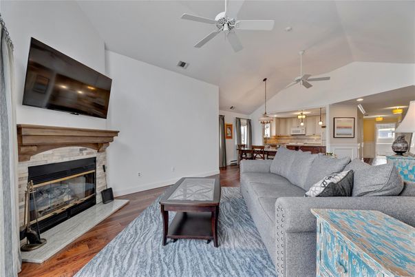 Dining room, Fireplace, Interior, Living room, Pendant Lights, Recessed Lighting, Wood Texture Flooring