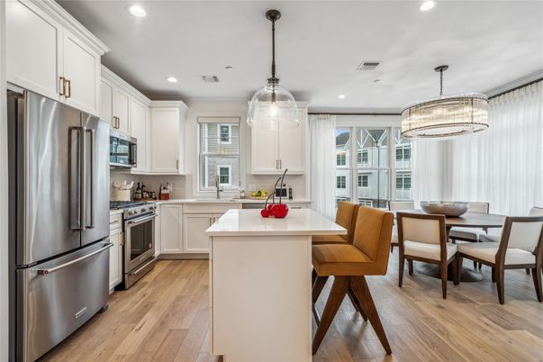 Chandelier, Dining room, Interior, Kitchen, Pendant Lights, Recessed Lighting, Stainless Steel Appliances, Wood Texture Flooring