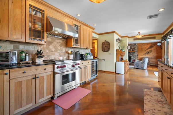 Interior, Kitchen, Recessed Lighting, Stainless Steel Appliances, Stone Walls, Wood Texture Flooring