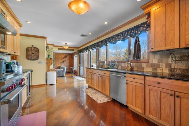 Interior, Kitchen, Recessed Lighting, Stainless Steel Appliances, Stone Walls, Wood Texture Flooring