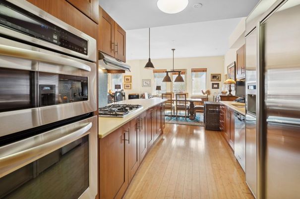 Dining room, Interior, Kitchen, Pendant Lights, Stainless Steel Appliances, Wood Texture Flooring