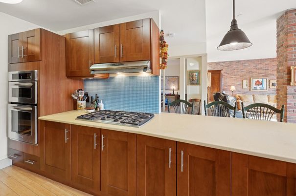 Dining room, Interior, Kitchen, Pendant Lights, Stainless Steel Appliances, Stone Walls, Wood Texture Flooring