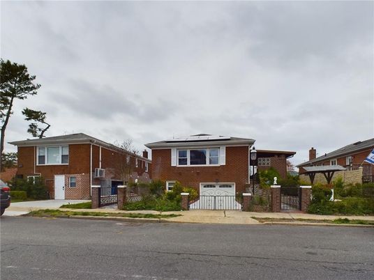 Attached, Exterior, Facade, Brick Facade, Solar Panels, Split Level