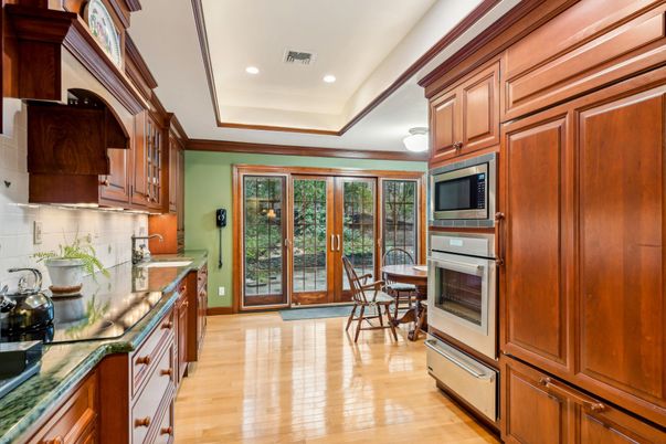 Dining room, Interior, Kitchen, Recessed Lighting, Stainless Steel Appliances, Wood Texture Flooring