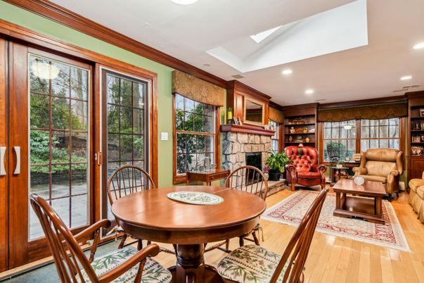 Dining room, Fireplace, Interior, Living room, Recessed Lighting, Wood Texture Flooring