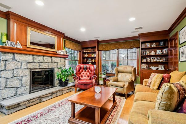 Fireplace, Interior, Living room, Recessed Lighting, Stone Walls, Wood Texture Flooring