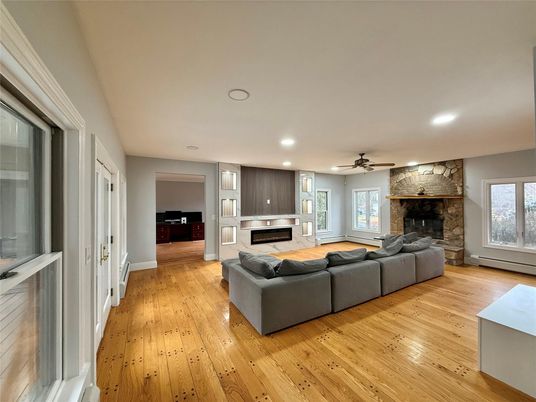 Fireplace, Interior, Kitchen, Living room, Recessed Lighting, Stone Walls, Wood Texture Flooring