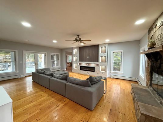 Fireplace, Interior, Living room, Recessed Lighting, Wood Texture Flooring