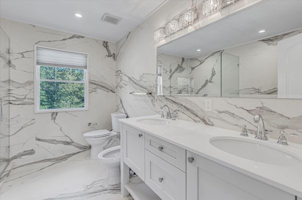 Bathroom, Dual Sink Vanities, Interior, Marble, Marble Walls, Recessed Lighting