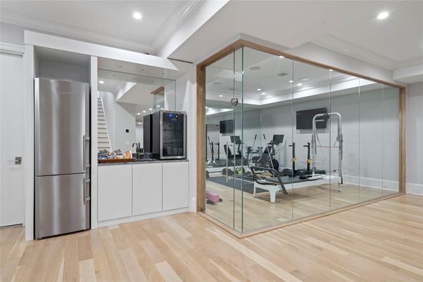 Fitness Equipment, Interior, Kitchen, Recessed Lighting, Stainless Steel Appliances, Wood Texture Flooring