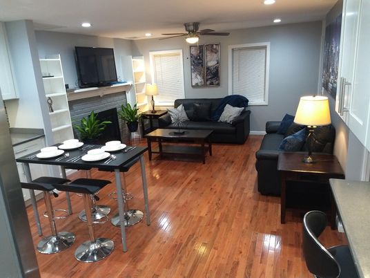 Dining room, Fireplace, Interior, Living room, Recessed Lighting, Wood Texture Flooring