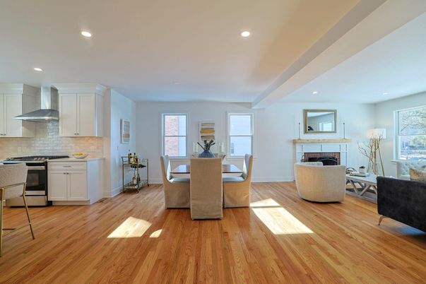 Dining room, Fireplace, Interior, Kitchen, Living room, Recessed Lighting, Stainless Steel Appliances, Wood Texture Flooring