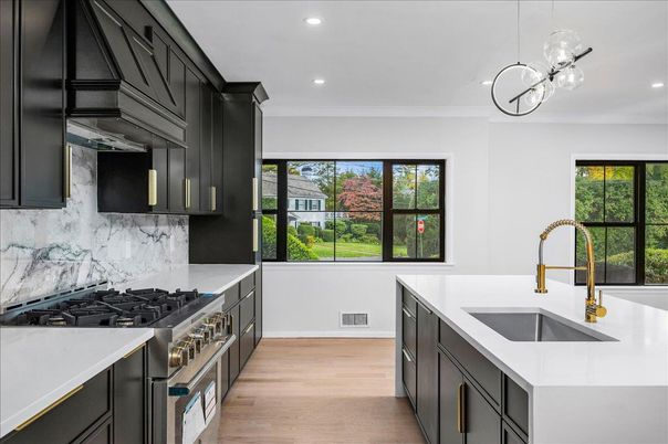 Interior, Kitchen, Marble Walls, Pendant Lights, Recessed Lighting, Stainless Steel Appliances, Wood Texture Flooring