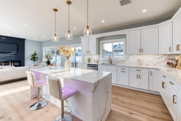 Fireplace, Interior, Kitchen, Living room, Marble Walls, Pendant Lights, Recessed Lighting, Wood Texture Flooring