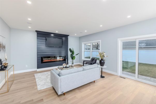 Fireplace, Interior, Living room, Recessed Lighting, Wood Texture Flooring