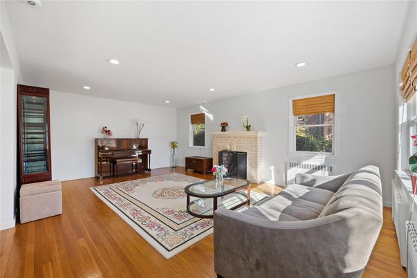 Fireplace, Interior, Living room, Piano, Recessed Lighting, Wood Texture Flooring