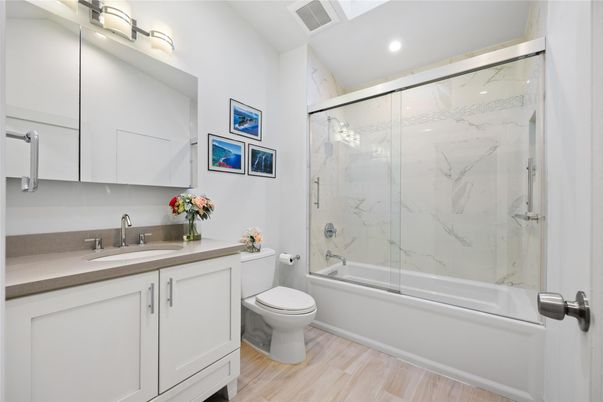 Bathroom, Glass Shower, Interior, Marble Walls, Recessed Lighting, Wood Texture Flooring