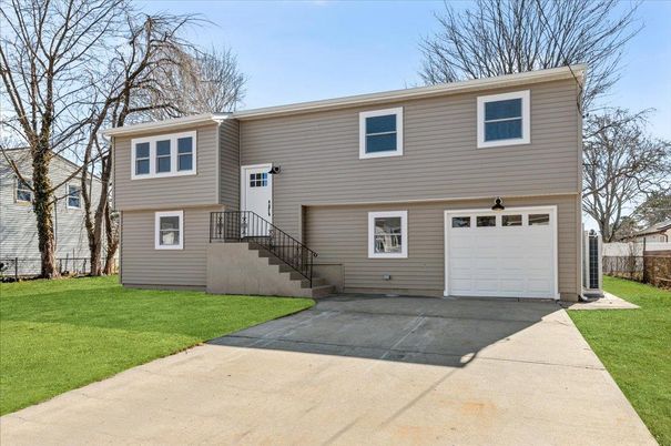 Attached, Exterior, Facade, Raised Ranch