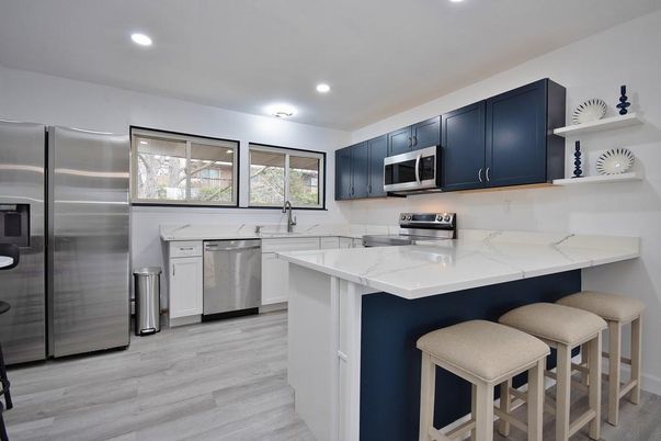 Interior, Kitchen, Recessed Lighting, Stainless Steel Appliances, Wood Texture Flooring