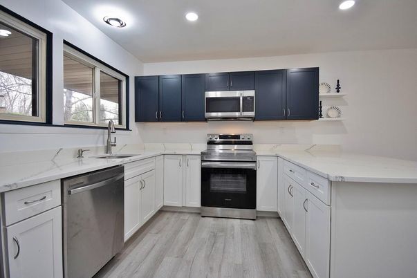 Interior, Kitchen, Recessed Lighting, Stainless Steel Appliances, Wood Texture Flooring