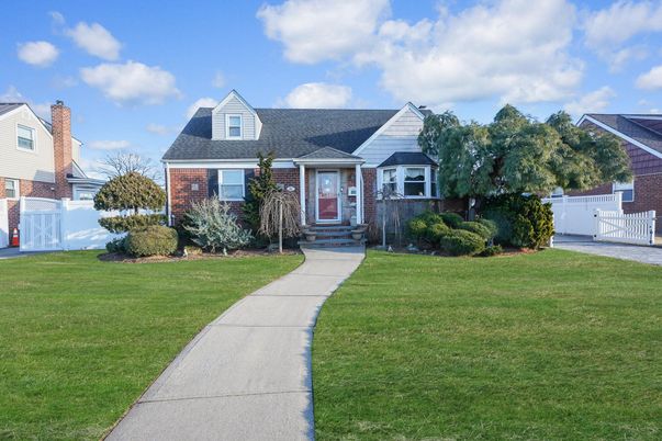 Exterior, Facade, Brick Facade, Cape Cod
